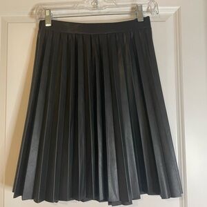 Artificial leather black skirt junior size L